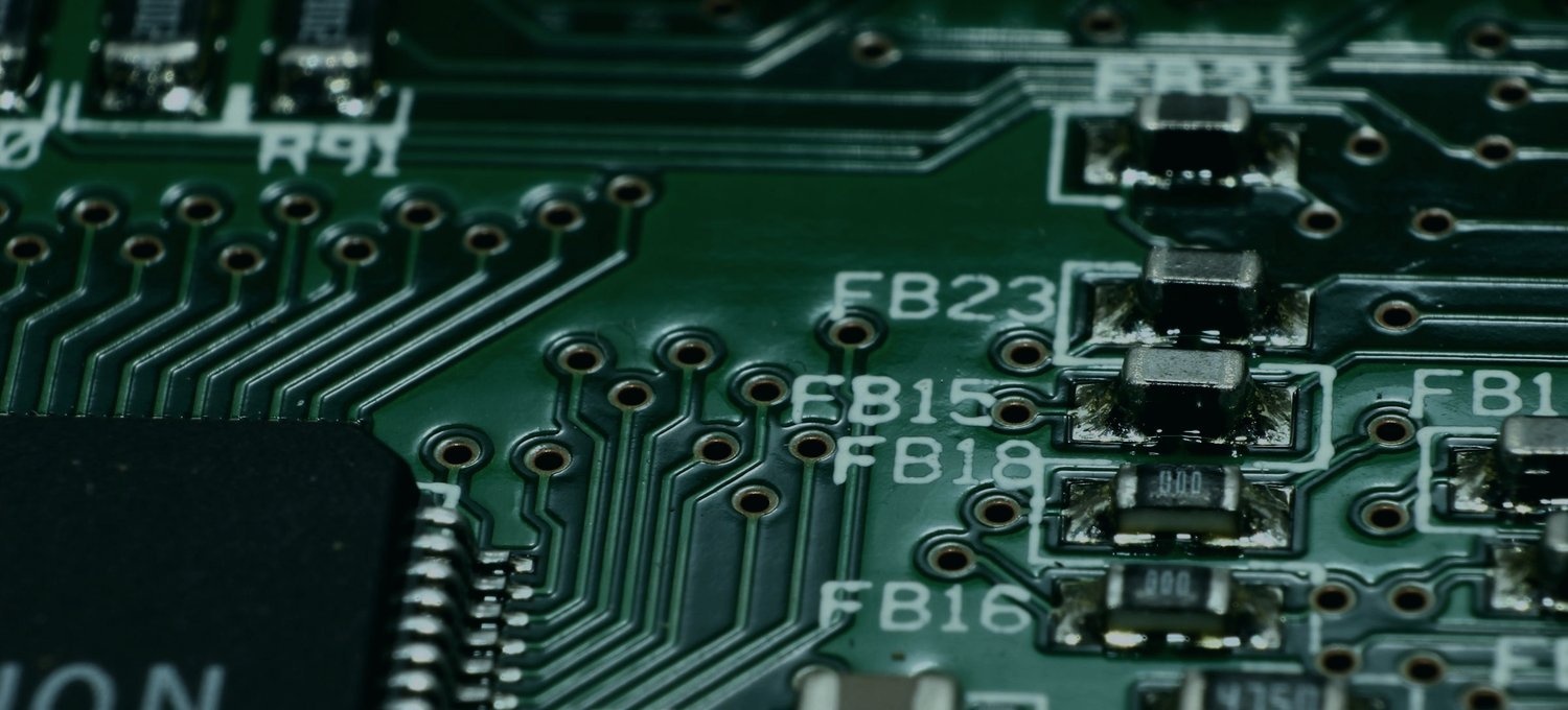 Circuit-board macro graded in dark cyan — on-chain crypto-poker visual
